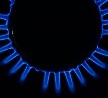 Lit blue gas ring, close-up by Sami Sarkis