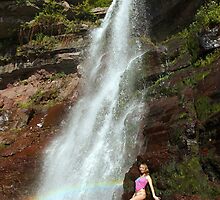 Young sexy beautiful girl stands at nature waterfall location 1 by Anton Oparin