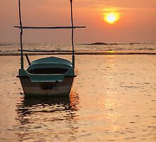 Boat at sunset by naumenko