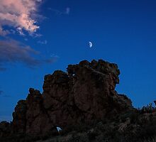 Moon over Devils Backbone Loveland Colorado by johnny gomez