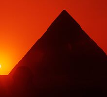 Egypt. Cairo. Giza. Sunset behind The Sphinx and Chephren Pyramid. by Steve Outram