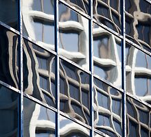 The one with the building reflecting off the windows of another building by David Librach - DL Photography -