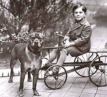 Boy on Cart with Pitbull by Tails of the Past