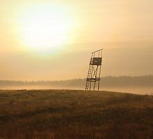 Old guard tower in sunrise by Antanas