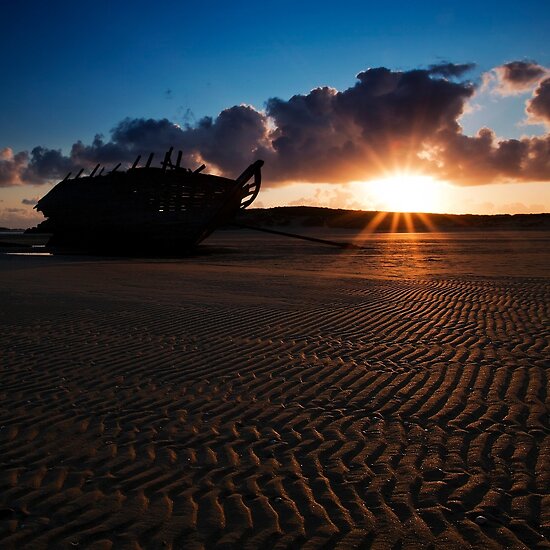 work.7447175.3.flat,550x550,075,f.shipwreck-sunset.jpg